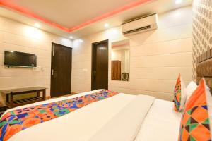 Ένα ή περισσότερα κρεβάτια σε δωμάτιο στο Via The Heights