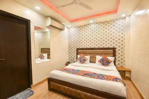 Ένα ή περισσότερα κρεβάτια σε δωμάτιο στο Via The Heights