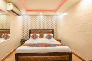 Ένα ή περισσότερα κρεβάτια σε δωμάτιο στο Via The Heights