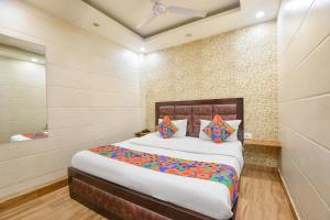 Ένα ή περισσότερα κρεβάτια σε δωμάτιο στο Via The Heights