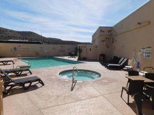 a swimming pool on top of a building at Hualapai Lodge in Peach Springs