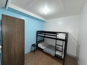 Postel nebo postele na pokoji v ubytování J and J Transient House