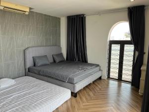 Ένα ή περισσότερα κρεβάτια σε δωμάτιο στο Katka Hotel River 2 Hai Phong +84 φωτογραφίες