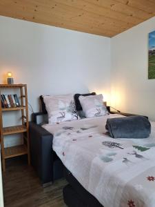 Postel nebo postele na pokoji v ubytování Dem Himmel ein Stuck näher