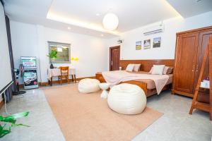 Ένα ή περισσότερα κρεβάτια σε δωμάτιο στο Katka Hotel River 2 Hai Phong