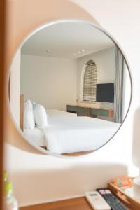 Μια τηλεόραση ή/και κέντρο ψυχαγωγίας στο Mimosa Hotel Phú Quốc