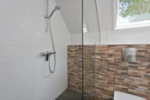 Koupelna v ubytování Jonkerstee 66 - Ouddorp De vrolijke noot Childfriendly near the beach - not for companies + 16 fotografií