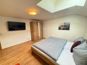 Postel nebo postele na pokoji v ubytování Loft 73