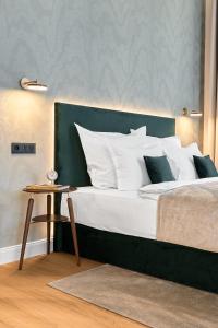 Postel nebo postele na pokoji v ubytování Villa Patriot Boutique Hotel