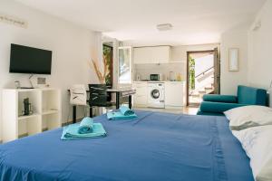 Ένα ή περισσότερα κρεβάτια σε δωμάτιο στο Appartamenti Tanja +47 φωτογραφίες