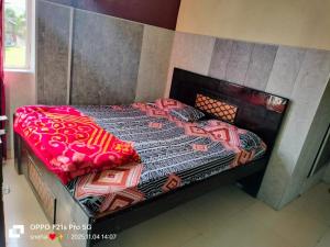 Postel nebo postele na pokoji v ubytování hotel daksh