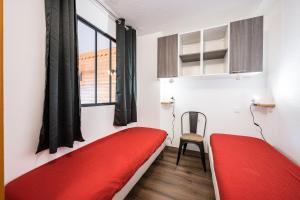 Ένα ή περισσότερα κρεβάτια σε δωμάτιο στο A2 201 Appart au pied des pistes