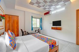 Μια τηλεόραση ή/και κέντρο ψυχαγωγίας στο FabHotel Shree Krishna Inn