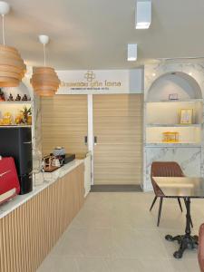 Kuchyň nebo kuchyňský kout v ubytování ปิกรพลอย บูทีค โฮเทล PIKORNPLOY Boutique Hotel