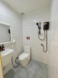 Koupelna v ubytování ปิกรพลอย บูทีค โฮเทล PIKORNPLOY Boutique Hotel