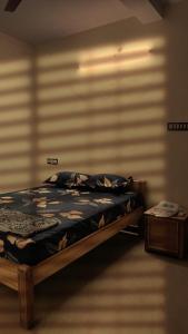 Postel nebo postele na pokoji v ubytování AMC Comfort Inn