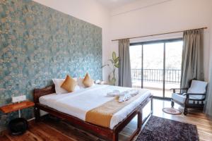 Postel nebo postele na pokoji v ubytování Askava Homestays