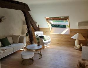 Χώρος καθιστικού στο Suite luxueuse et bien être Le refuge