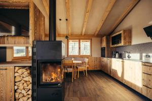 Kuchyň nebo kuchyňský kout v ubytování Chalet Hugo