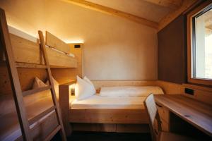 Postel nebo postele na pokoji v ubytování Chalet Hugo