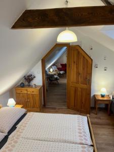 Postel nebo postele na pokoji v ubytování Apartmán Bechyně