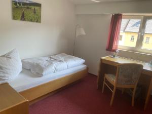 Postel nebo postele na pokoji v ubytování Hotel Zum Alten Brauhaus