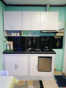 Kuchyň nebo kuchyňský kout v ubytování Summer Loft + 9 fotografií