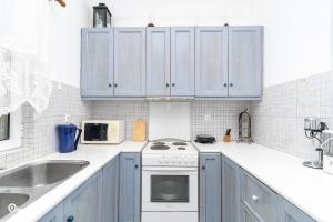 Η κουζίνα ή μικρή κουζίνα στο Paros Stone & Sun Retreat