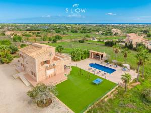 an aerial view of a house with a pool at Villa Es Contes by Slow Villas in Santanyi