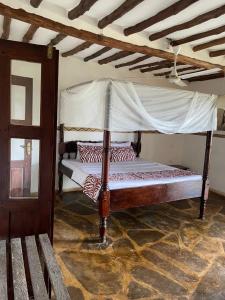 Postel nebo postele na pokoji v ubytování Evara House