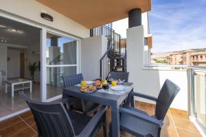 Balkón nebo terasa v ubytování AlmeriaSuite Palm Beach II