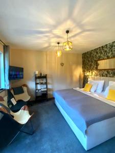 Postel nebo postele na pokoji v ubytování Resort Lesní Lázně