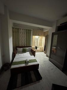 Afbeelding uit fotogalerij van Rooftop Inn in Guwahati