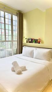 Ένα ή περισσότερα κρεβάτια σε δωμάτιο στο Hanoi Brilliant Home