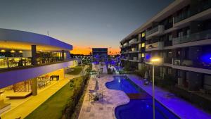 an overhead view of a building with a swimming pool at Makia Beach experience 107 D Premium in Ipojuca +3 photos