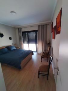 Ένα ή περισσότερα κρεβάτια σε δωμάτιο στο Gite espumante