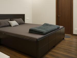 Ένα ή περισσότερα κρεβάτια σε δωμάτιο στο Stay Royal Villa Bnb Gf