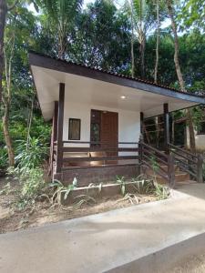 a small house with a porch at Tay Deling's Place in El Nido +5 photos