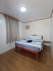 Postel nebo postele na pokoji v ubytování Tay Deling's Place