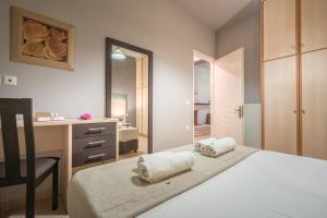 Postel nebo postele na pokoji v ubytování Armonia Boutique Hotel