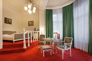 Ένα ή περισσότερα κρεβάτια σε δωμάτιο στο acom Hotel Berlin Kurfürstendamm +25 φωτογραφίες