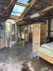 Ένα ή περισσότερα κρεβάτια σε δωμάτιο στο River meets the Sea