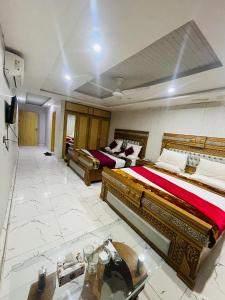 TV a/nebo společenská místnost v ubytování Hotel Golden Tree