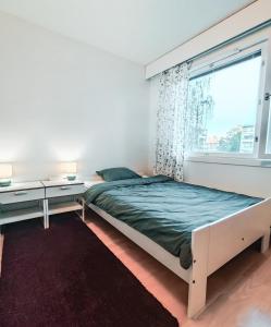 Ένα ή περισσότερα κρεβάτια σε δωμάτιο στο Spacious and Comfy Apartment, 15 Mins from Airport, 17 Minutes to City Center