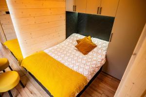 Ένα ή περισσότερα κρεβάτια σε δωμάτιο στο Mini Chatki