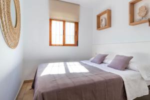 Ένα ή περισσότερα κρεβάτια σε δωμάτιο στο Playa Oliva Jessica