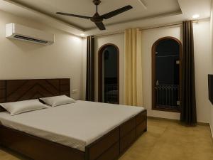 Ένα ή περισσότερα κρεβάτια σε δωμάτιο στο STAY ROTAL VILLA BNB 1st F +2 φωτογραφίες