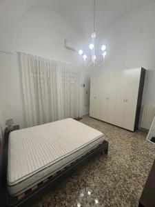 Ένα ή περισσότερα κρεβάτια σε δωμάτιο στο Magioile