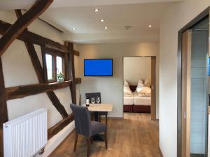 TV a/nebo společenská místnost v ubytování Gasthof Zum Ochsen