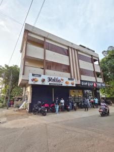 a building with motorcycles parked in front of it at The Urban Escape in Udupi +63 photos